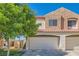 Charming two-story home featuring a two-car garage and well-maintained landscaping in a sunny location at 1672 Cloister Ave, Henderson, NV 89014