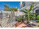 Landscaped backyard patio with tropical plants at 1672 Cloister Ave, Henderson, NV 89014