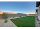 A large artificial lawn complements the property, offering a low-maintenance outdoor living space at 168 Robledo St, Las Vegas, NV 89138