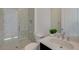 Bathroom featuring a glass-enclosed shower, toilet, and vanity with sink at 168 Robledo St, Las Vegas, NV 89138