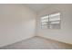 An airy bedroom with a large, sunlit window, offering a comfortable and inviting space at 168 Robledo St, Las Vegas, NV 89138