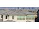 View of Las Vegas skyline and distant mountains from a rooftop of a residential community at 168 Robledo St, Las Vegas, NV 89138