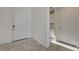 Hallway view shows access to a bathroom, closet, and a room with a window at 168 Robledo St, Las Vegas, NV 89138