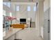 Open-concept floor plan featuring a bright living area with marble fireplace and soaring ceilings at 168 Robledo St, Las Vegas, NV 89138