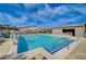 Community pool features ample seating, easy access, and a nearby bathhouse at 168 Robledo St, Las Vegas, NV 89138
