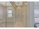 Bright bathroom showcasing the glass enclosed shower with marble-look tile at 168 Robledo St, Las Vegas, NV 89138