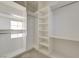 Spacious walk-in closet features built in shelves and hanging rods for optimal storage at 168 Robledo St, Las Vegas, NV 89138