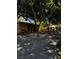 Community building with mature trees and lush landscaping at Pueblo Park at 1812 Jack Rabbit Way, Las Vegas, NV 89128