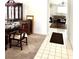 Dining room with tile flooring leading into the living room at 1812 Jack Rabbit Way, Las Vegas, NV 89128