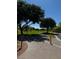 Greenspace with sidewalks and mature trees throughout the Pueblo Park community at 1812 Jack Rabbit Way, Las Vegas, NV 89128