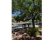 Landscaping featuring desert landscaping with a tree in the front and a view of the street at 1812 Jack Rabbit Way, Las Vegas, NV 89128