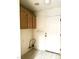 Mud room with storage cabinets and access to exterior back door at 1812 Jack Rabbit Way, Las Vegas, NV 89128