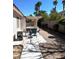 Covered patio with outdoor seating, ideal for dining or relaxing in the shade at 1812 Jack Rabbit Way, Las Vegas, NV 89128