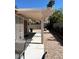 Covered patio with concrete flooring, shaded by a pergola, perfect for outdoor enjoyment at 1812 Jack Rabbit Way, Las Vegas, NV 89128