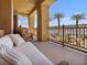 Spacious balcony featuring comfortable seating and stunning views of the water at 20 Via Mantova # 208, Henderson, NV 89011