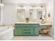 Elegant bathroom has a dual sink vanity, a soaking tub and generous counter space at 20 Via Mantova # 208, Henderson, NV 89011