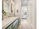 Well-lit bathroom leads into the bedroom and features marble countertops at 20 Via Mantova # 208, Henderson, NV 89011