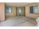 A spacious covered patio with tile flooring, offering an inviting outdoor living space at 20 Via Mantova # 208, Henderson, NV 89011