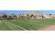 Community baseball field with manicured lawn and mountain views at 2013 Capestone St, Las Vegas, NV 89134