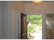 Home's entrance features a decorative glass panel and a view of the landscaped front yard at 2013 Capestone St, Las Vegas, NV 89134