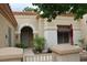 Warm and welcoming front entrance with well-manicured garden and stylish security door at 2013 Capestone St, Las Vegas, NV 89134