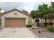 Charming single-story home with a two-car garage and well-maintained landscaping at 2013 Capestone St, Las Vegas, NV 89134