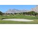 Picturesque golf course view with lush green fairways and mountain views in the background at 2013 Capestone St, Las Vegas, NV 89134