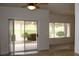Bright living area with sliding glass doors and scenic golf course views at 2013 Capestone St, Las Vegas, NV 89134