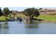 Picturesque pond with a waterfall feature, set against a lush golf course and well-maintained homes at 2013 Capestone St, Las Vegas, NV 89134