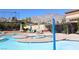 Resort-style pool featuring a splash fountain and community seating with scenic mountain views at 2013 Capestone St, Las Vegas, NV 89134