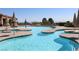 Leisure pool with surrounding seating and umbrellas at 2013 Capestone St, Las Vegas, NV 89134
