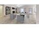 Bright living room features fireplace, built-in shelves, and large window at 2056 Oliver Springs St, Henderson, NV 89052