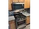 Close-up of a well-equipped kitchen with modern stainless-steel appliances and sleek countertops for easy cooking at 2200 S Fort Apache Rd # 2071, Las Vegas, NV 89117