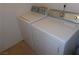 A laundry room features a white washer and dryer set, providing convenience for household chores at 2200 S Fort Apache Rd # 2071, Las Vegas, NV 89117