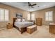Bedroom features soft carpet, a ceiling fan and a window with plantation shutters at 2425 Amatrice St, Henderson, NV 89044