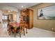 Dining room with tile flooring, and a table at 2425 Amatrice St, Henderson, NV 89044