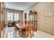 Dining room with tile flooring, and a table at 2425 Amatrice St, Henderson, NV 89044
