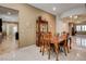 Dining room with tile flooring, and a table at 2425 Amatrice St, Henderson, NV 89044