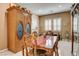 Dining room with tile flooring, and a table at 2425 Amatrice St, Henderson, NV 89044