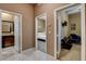 Hallway with views to the bedroom, vanity area, and Gathering room at 2425 Amatrice St, Henderson, NV 89044