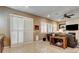 Cozy living room featuring shuttered windows, comfortable seating, and stylish decor, creating a welcoming ambiance at 2425 Amatrice St, Henderson, NV 89044