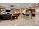 Open-concept living space seamlessly blends the kitchen and living area, perfect for modern living and entertaining at 2425 Amatrice St, Henderson, NV 89044