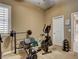 Home gym featuring various workout equipment and neutral-toned walls at 2425 Amatrice St, Henderson, NV 89044