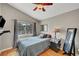 Well-lit bedroom with vaulted ceiling and view to the neighborhood at 2429 Sun Shores Dr, Las Vegas, NV 89128
