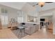 Inviting living room featuring soaring ceilings, tile floors, neutral walls, and an open concept design at 2429 Sun Shores Dr, Las Vegas, NV 89128
