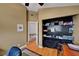 Office features a desk, closet, hardwood floors, and neutral paint at 2429 Sun Shores Dr, Las Vegas, NV 89128