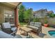 Cozy covered patio with comfortable seating, ideal for relaxing and enjoying the outdoor space at 2429 Sun Shores Dr, Las Vegas, NV 89128