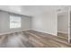 Spacious bedroom featuring wood floors and a sunny window at 2451 N Rainbow Blvd # 2144, Las Vegas, NV 89108