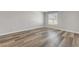Bright bedroom with wood floors and a window at 2451 N Rainbow Blvd # 2144, Las Vegas, NV 89108