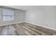 Bright bedroom features modern gray flooring and a neutral color palette throughout at 2451 N Rainbow Blvd # 2144, Las Vegas, NV 89108